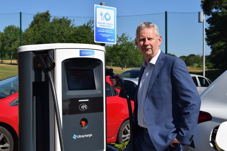 AA president Edmund King at a bp pulse chargepoint in 2018. Image: bp pulse