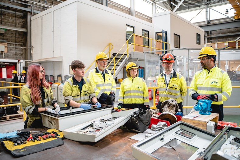 Scottish First Minister Humza Yousaf with apprentices at SSE Thermal's power station. Image: SSE