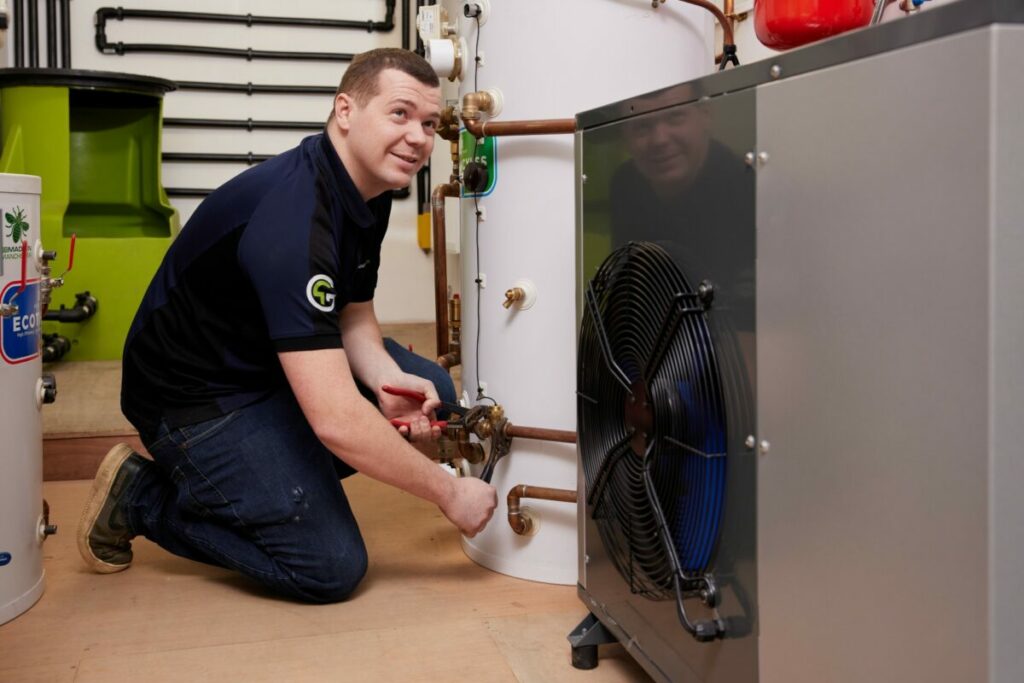 A heat pump engineer from Groundtherm Ltd working at Bolton College. Image: Groundtherm