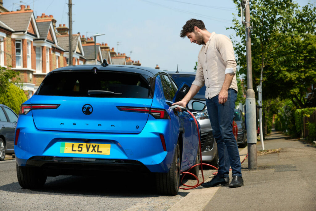 Man Charging EV in UK