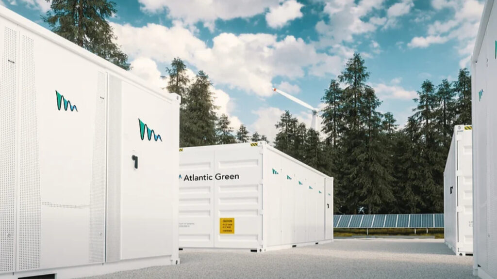 A battery energy storage system under a clear blue sky with trees behind.