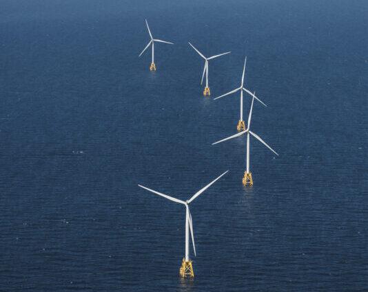 wind turbines in a deep blue sea