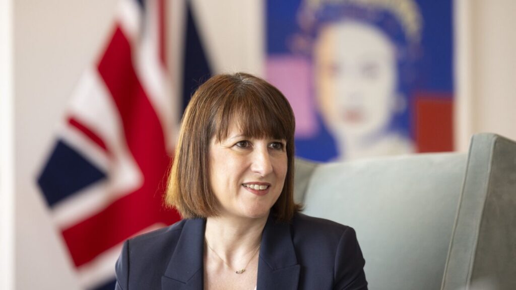 Rachel Reeves, a white woman with short dark hair in a bob, sits facing slightly away from camera