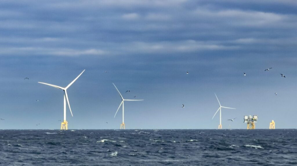 wind turbines on a blue sea