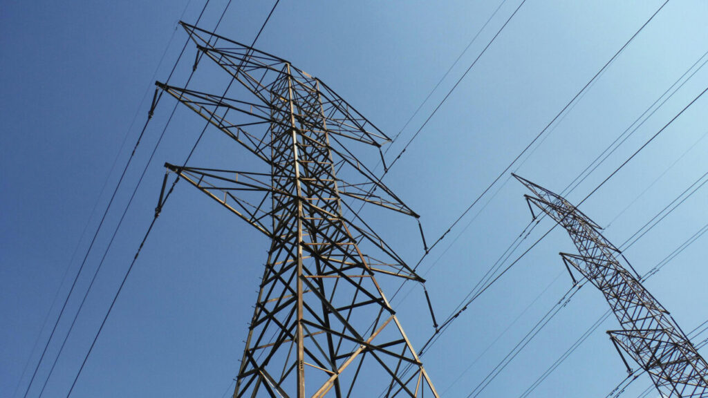 Electricity pylon shot from below.