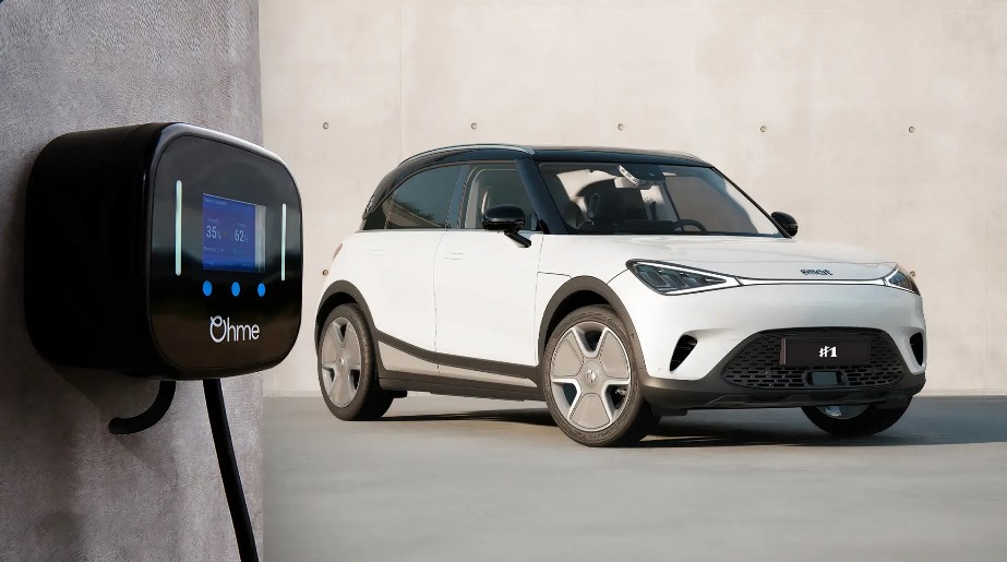 an ohme charger plugged into a smart car