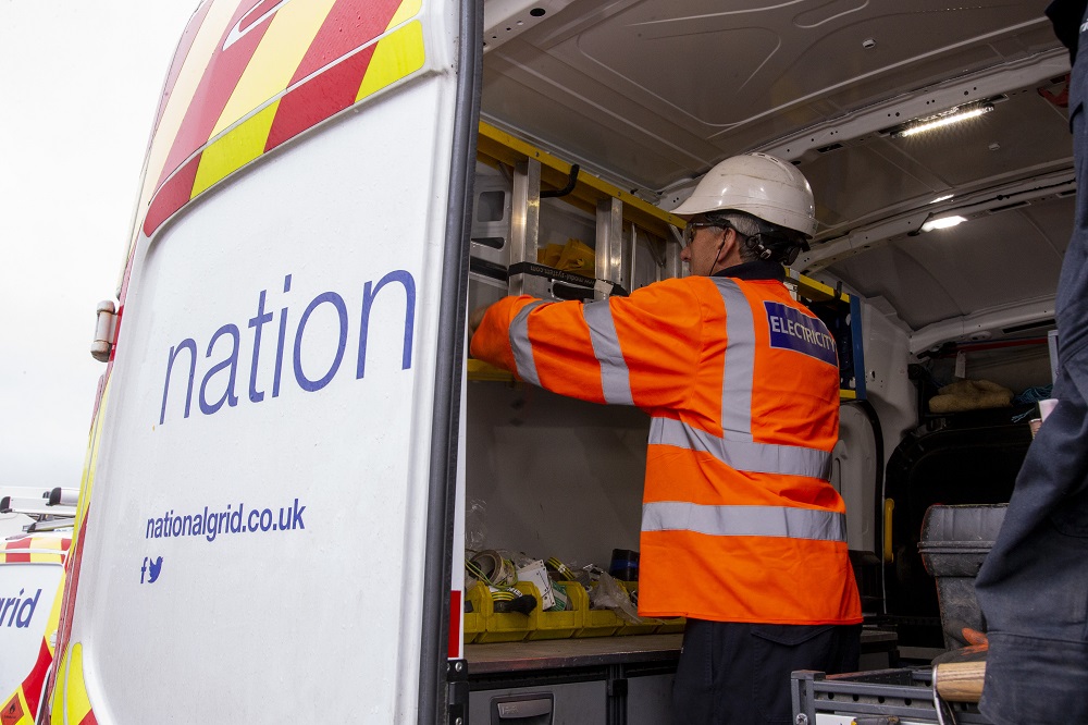 an NGED engineer works in his van