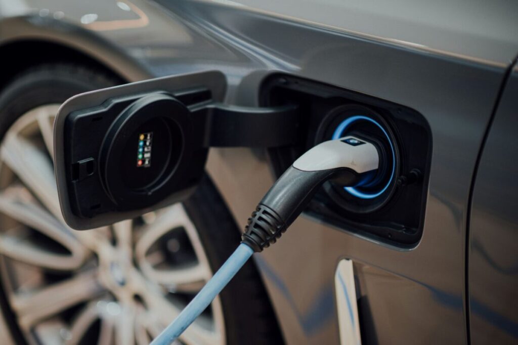 an ev charger plugged into a car