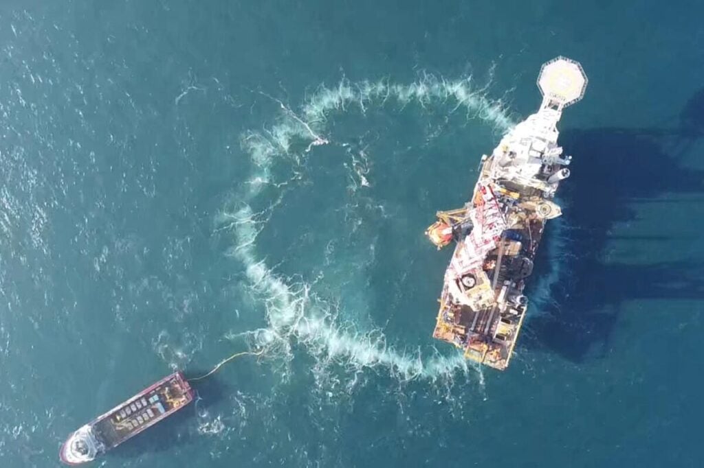 a ring of bubbles around a wind turbine from a top down view