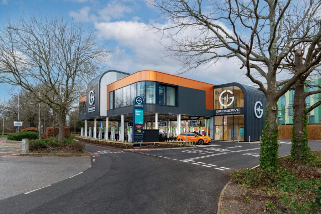 a modern orange and glass building