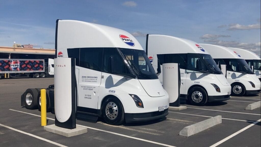 pesico trucks lined up at an ev charger