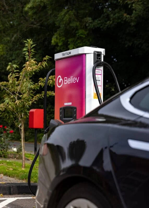 a pink believ EV charger
