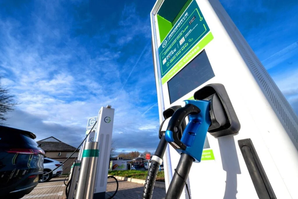 a close up from a low angle of a gridserve EV charger