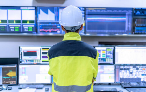 Engineer working at control room,Manager control system,Technician man monitoring program from a lot of monitor. Image: reewungjunerr via Adobe