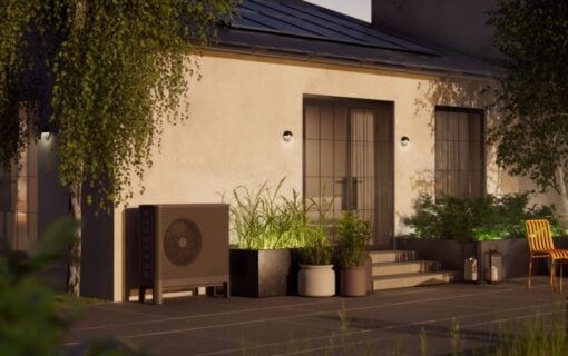 an air source heat pump outside a modern home