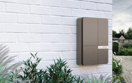 a steel ev charger box on an external wall