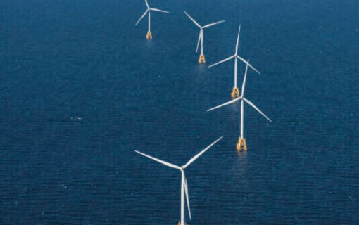wind turbines in a deep blue sea