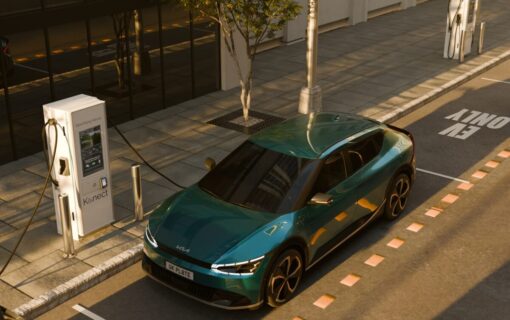 a 3d render of an EV plugged into a public chargepoint on the road