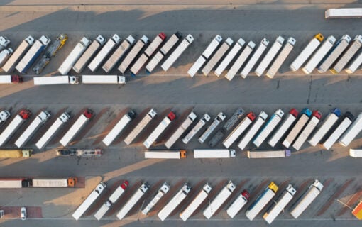 a birds-eye view of a series of parked trucks
