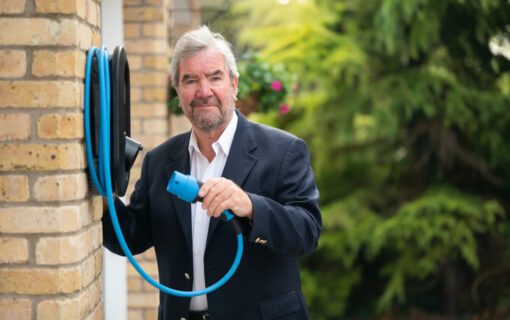 EVIOS founder David Martell and the company's first chargepoint. Image: EVIOS.