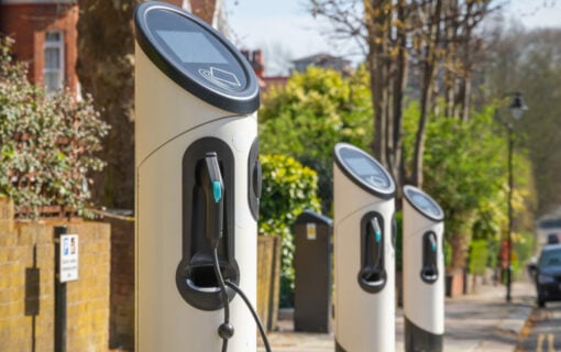 EV chargers lined up on a residential street