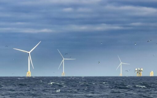 wind turbines on a blue sea