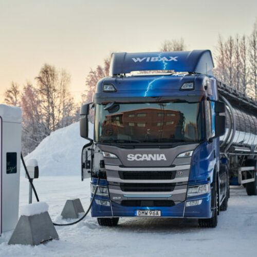 A heavy duty electric truck at a roadside charging point in Sweden. Image: Dan Boman / Scania.