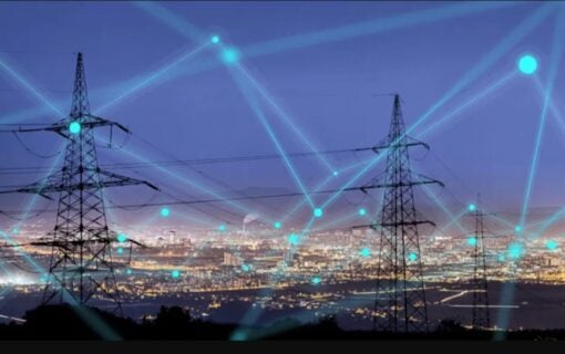 Pylons over an evening sky connected by blue lines