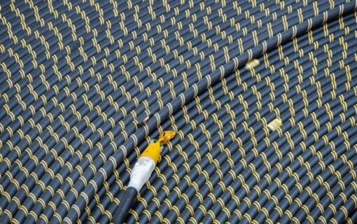 A close up on a wound up coil of electric cabling
