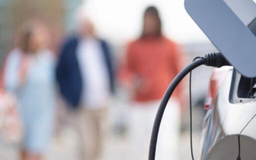 A close up of an EV plugged into a chargepoint