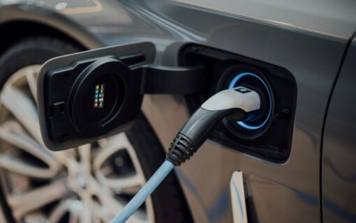 an ev charger plugged into a car