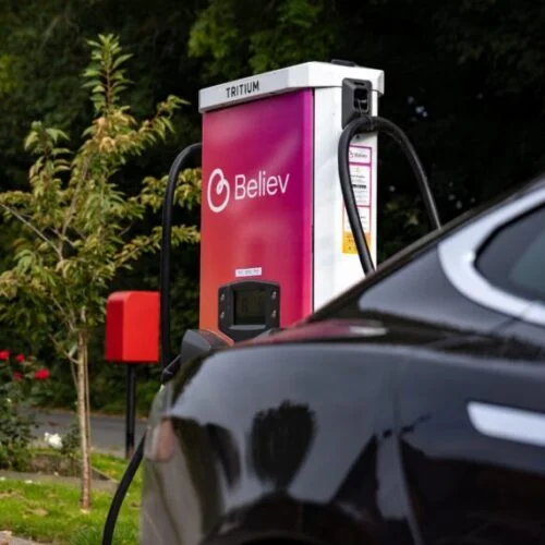 a pink believ EV charger