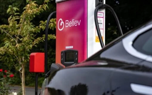 a pink believ EV charger