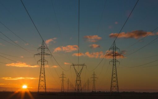 Electricity pylons at sunset