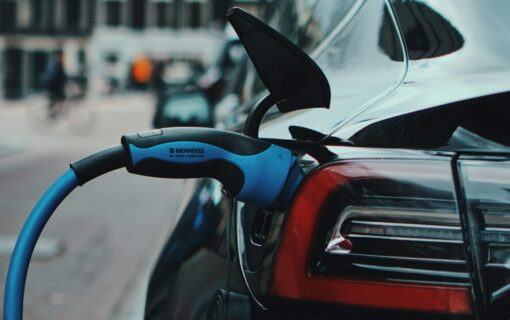 close up of an ev charger plugged into a car