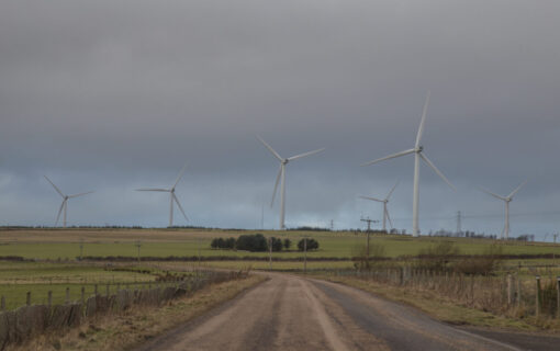 Wind turbines and grid lines in Scotland.
