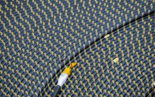 coiled up striped transmission cable