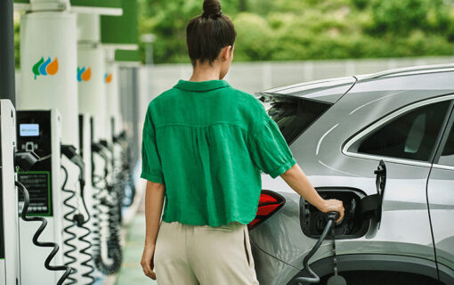 A woman charging her EV. Image: ScottishPower